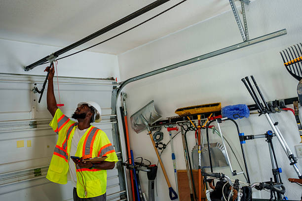 Professional Garage Door Panel Replacement technician working in Vinton, TX
